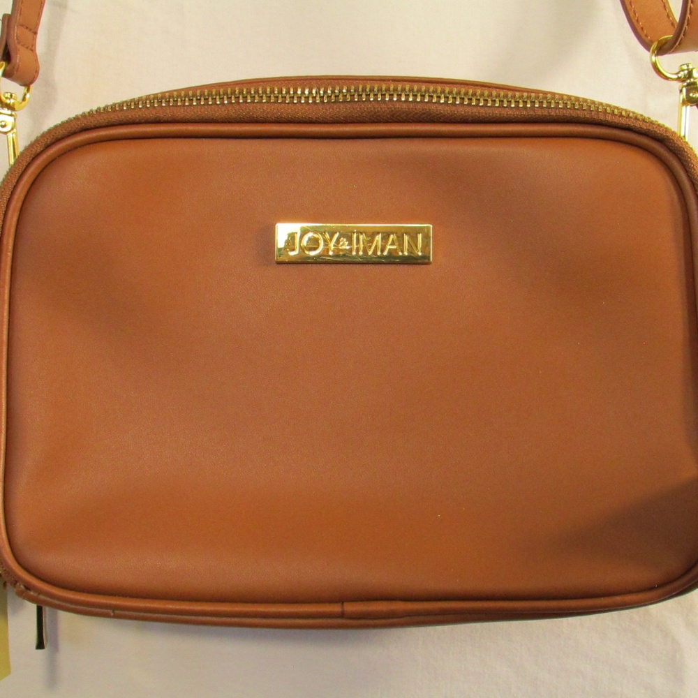 Joy & Iman tan leather bag is a crossbody purse Gold zippers & Removable Strap